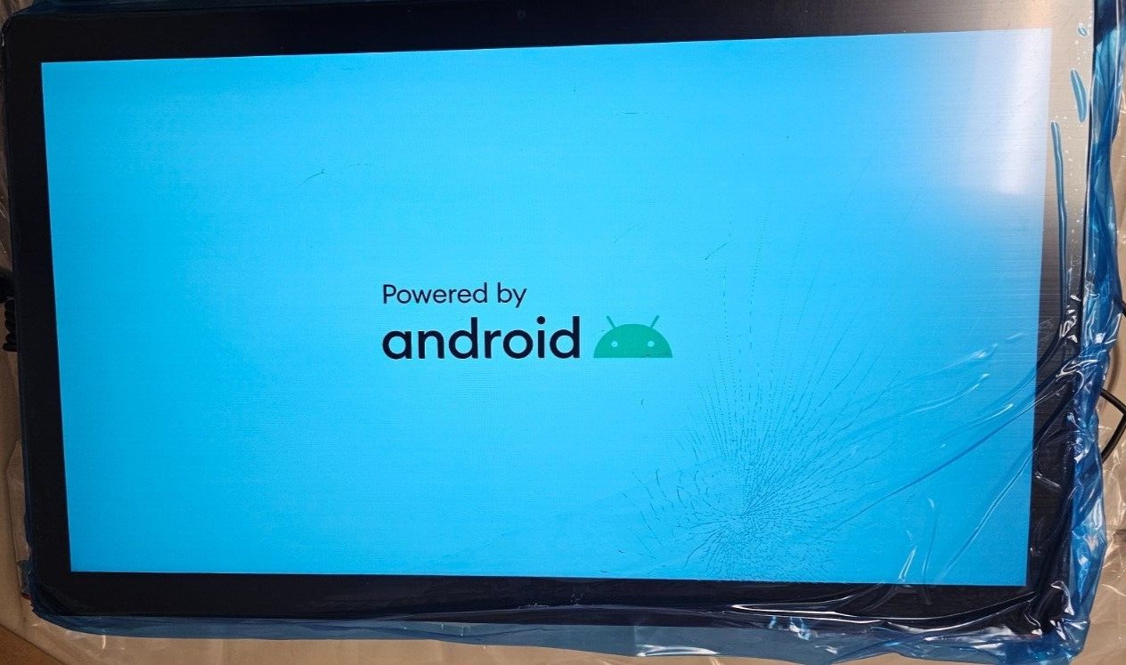 21.5-inch 3M all-in-one touchscreen monitor with a sleek black frame, displaying a blue screen with "Powered by Android" text and a green Android logo.