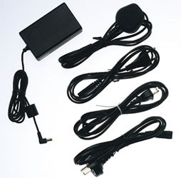 Black Acer 60W AC adapter with a rectangular power brick, multiple black cables, including a right-angle connector and a standard plug for notebook charging.