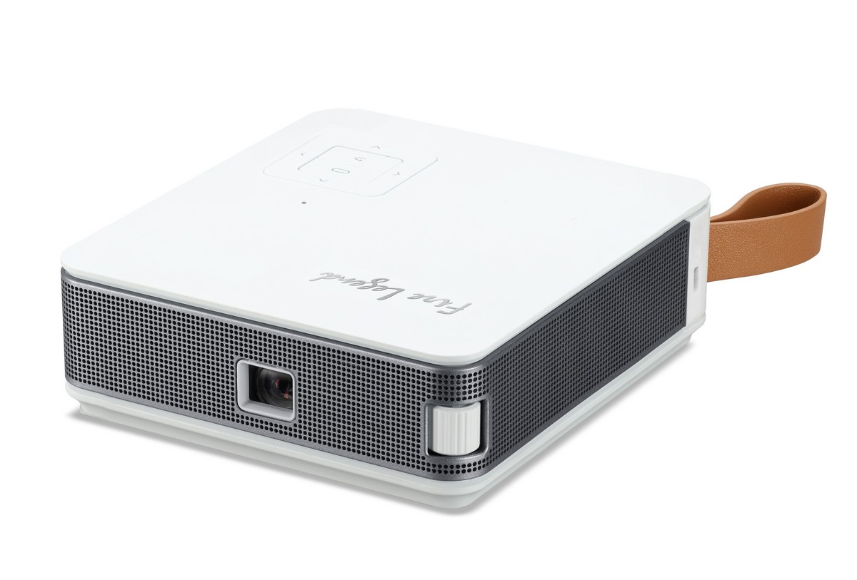 Compact white DLP projector with a textured black grille, featuring a lens on one side, control buttons on top, and a brown leather strap for portability.