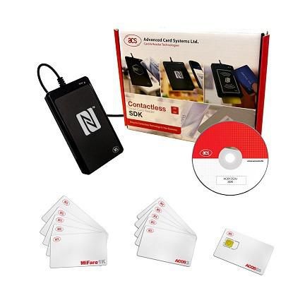 Black contactless SDK reader with a USB cable, accompanied by a software CD, multiple white MIFARE cards, and a card with a gold chip, all in a branded box.