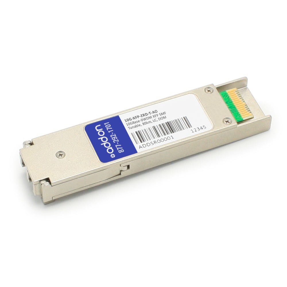 Silver metal 10G-XFP-ZRD-T-AO network transceiver module with a green and gold connector, featuring a blue label with white text and a barcode on one side.