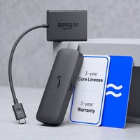 AIRTAME Go bundle with black Amazon Signage Stick, Ethernet adapter, and 3-year license and warranty cards.