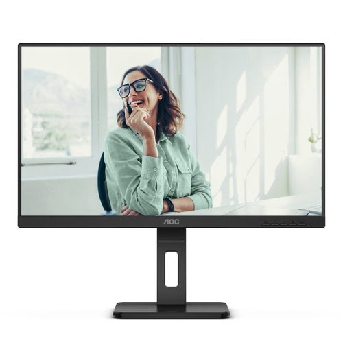 AOC 24P3CV 23.8" Full HD LED monitor with a sleek black frame, featuring a minimalist design and a sturdy black stand, displaying a smiling woman in a bright office setting.