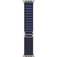 Apple 49mm Navy Alpine Loop watch band, medium size, with natural titanium finish and textured strap design.