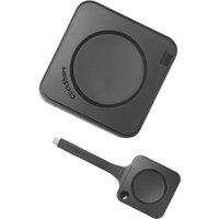 Black Barco ClickShare Hub Core with circular touchpad and USB-C dongle for video conferencing.