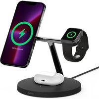 Black Belkin wireless charging stand with slots for smartphone, smartwatch, and earbuds on a sleek round base.