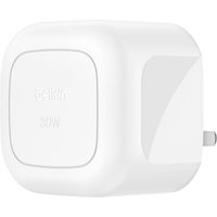White Belkin BoostCharge USB wall charger with rounded edges and AC plug for fast indoor mobile phone charging.