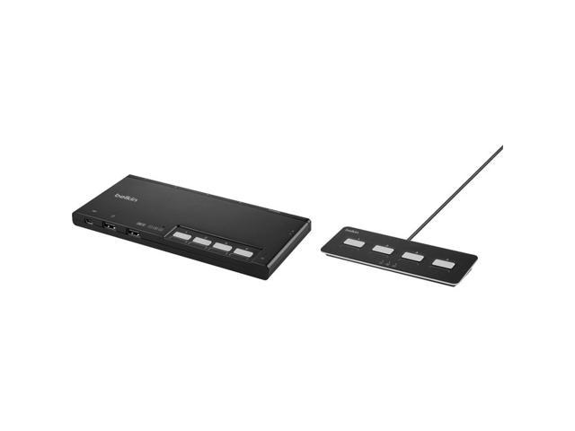 Belkin F1DN204MOD-HH-4 KVM switch in black with a sleek design, featuring multiple input buttons and a separate remote control for easy access.
