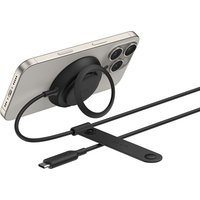 Black Belkin wireless charger with USB cable attached to a smartphone, featuring a sleek circular design.