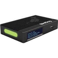 Compact black device with a ribbed surface, featuring a green LED indicator and a small display screen, designed for 4K HDMI video output at 3840 x 2160 pixels.