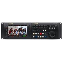 Black digital video recorder with a large display screen, multiple control buttons, and knobs, featuring a sleek design and professional-grade connectivity options.