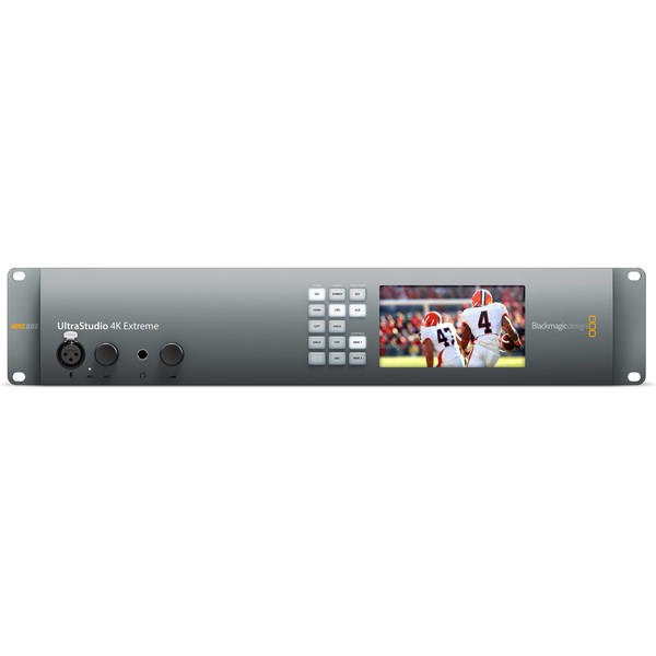 Blackmagic Design UltraStudio 4K Extreme 3 features a sleek gray metal chassis, front panel with buttons, and a small display screen showcasing video input.