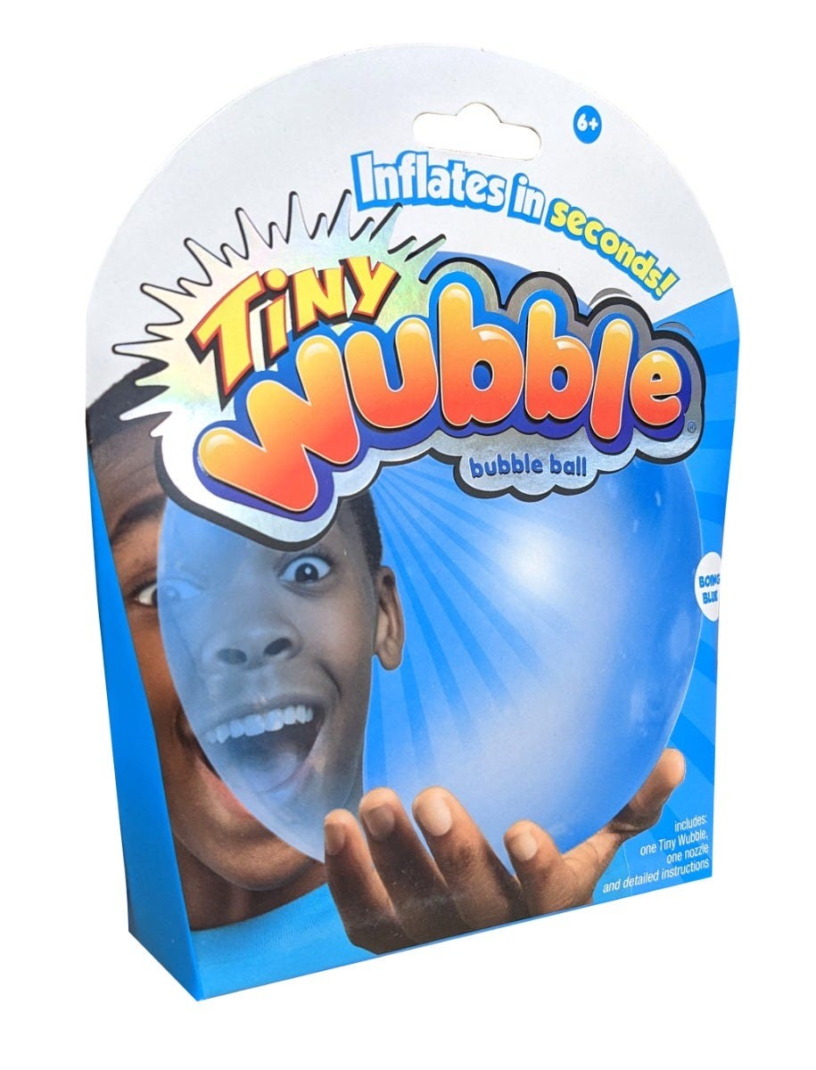 Bright blue Tiny Wubble Bubble Ball packaged in a colorful box featuring a smiling child, with the text "Inflates in seconds!" prominently displayed.
