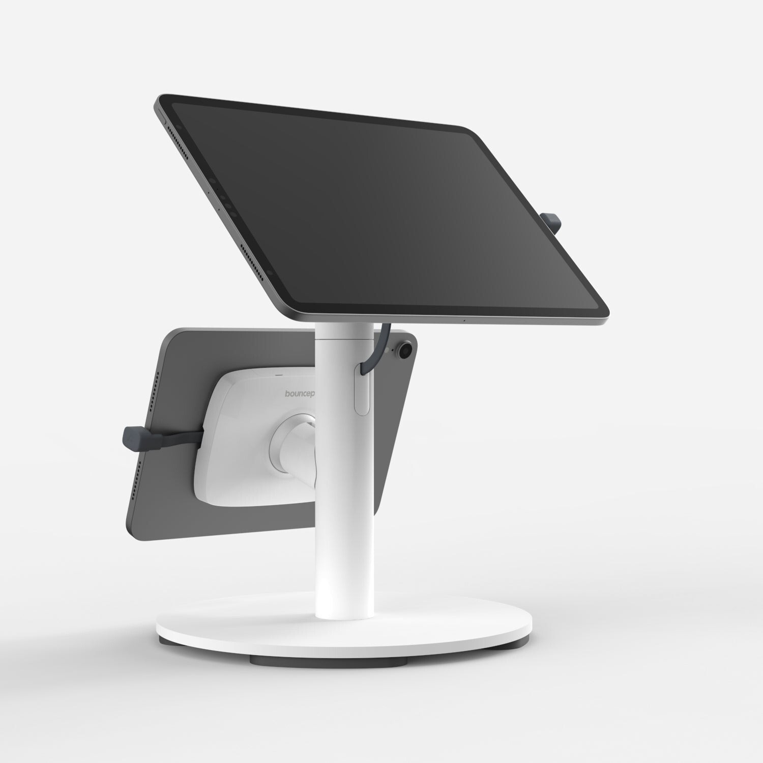 White Bouncepad Core Twin with counter base, featuring adjustable tablet holders, USB-C compatibility, and a sleek, modern design.