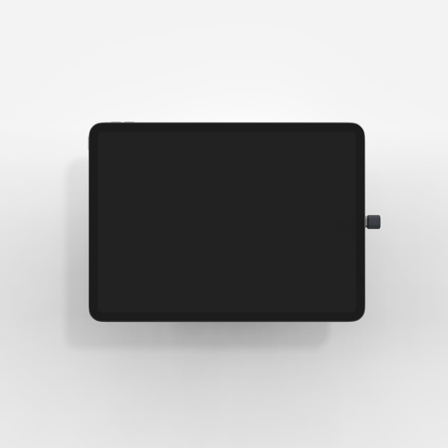White Bouncepad Core Vesa designed for USB-C tablets, featuring a sleek, minimalist design with a smooth surface and a side knob for secure attachment.