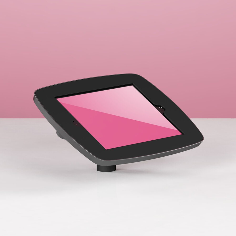 Black Bouncepad Desk for Samsung Galaxy Tab A 10.5 (2018) features a sleek, angled design with an exposed front, set against a soft pink background.