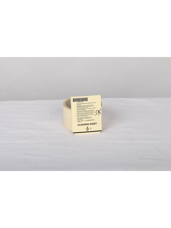 Yellow cleaning sheet roll with a printed label displaying product information and instructions, set against a plain white background.