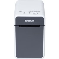 Compact white and gray Brother TD-2135NWB label printer with front feed slot and top control buttons.