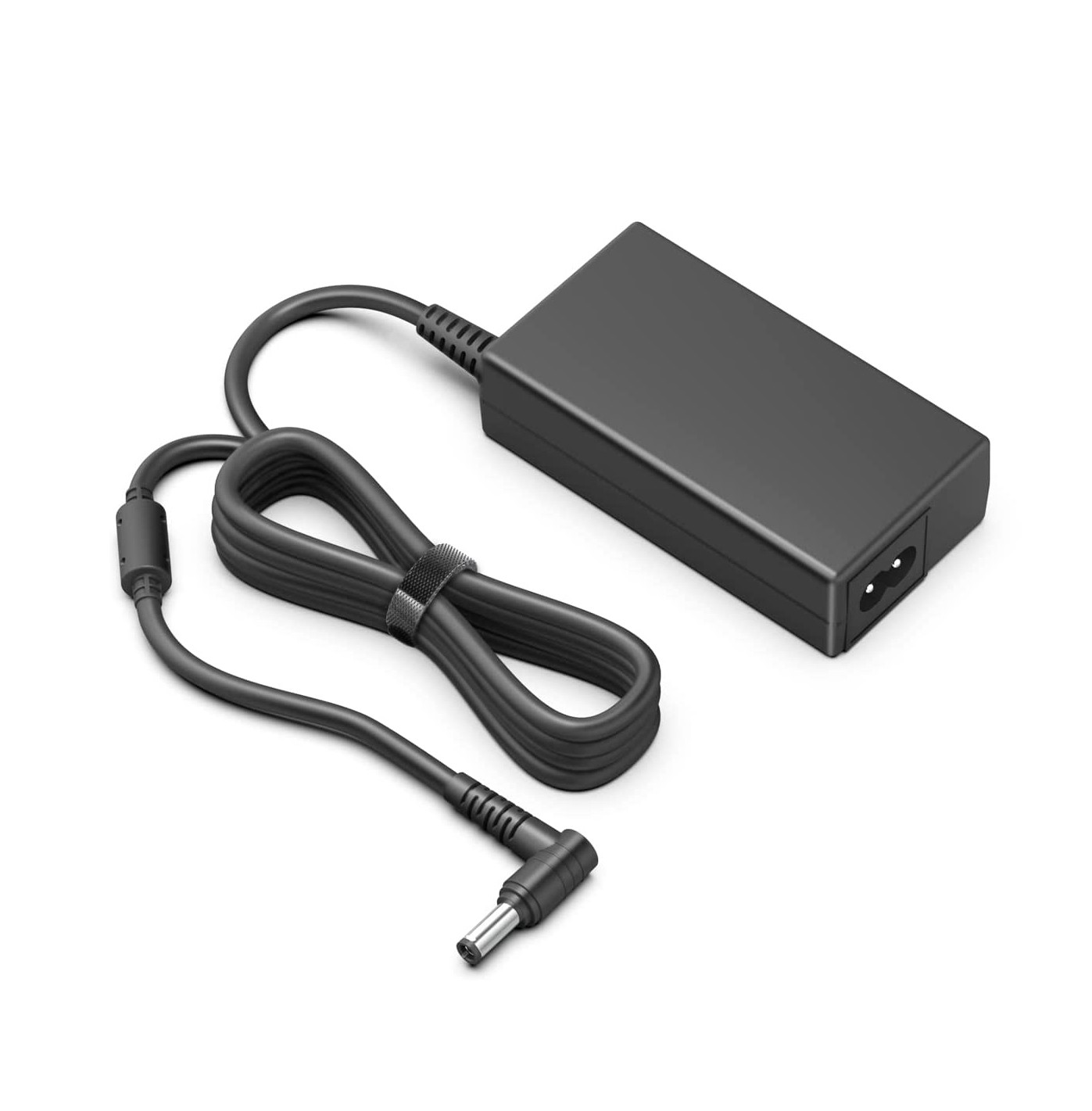 Black BTI 65W charger with a rectangular body, featuring a 5.5mm x 2.5mm tip and a UK plug, accompanied by a coiled power cable.