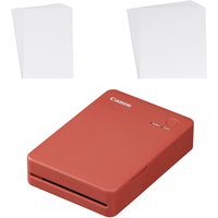 Red Canon SELPHY QX20 photo printer with dye-sublimation, 287x287 DPI, compact design, shown with two stacks of paper.