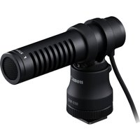 Black Canon Stereo Microphone DM-E100 with cylindrical design, side vents, and attached cable.