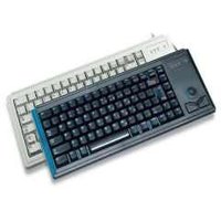 Black Cherry USB keyboard with gold accents, compact layout, and integrated trackball, overlapping a white keyboard.