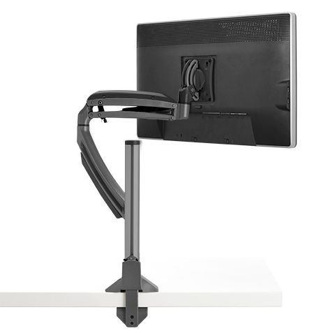 Black Chief K1C120B monitor mount with an adjustable arm, supporting a 30" display, featuring a sleek design and sturdy metal construction, attached to a white desk surface.