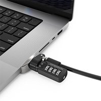 Silver Compulocks Ledge Lock Adapter with black combination cable lock attached to MacBook Pro 16" corner.