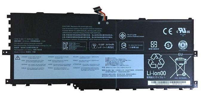 Black lithium-ion laptop battery with multiple labels, a connector cable, and a recycling symbol, designed as a spare part for CoreParts laptops.