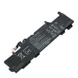 Black laptop battery with multiple connection ports, safety symbols, and printed specifications, designed for CoreParts MBXHP-BA0208 model.