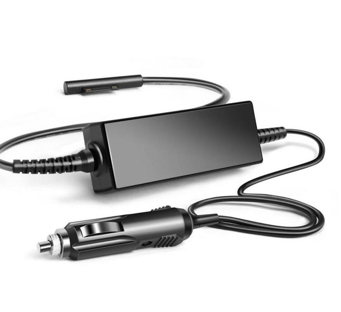 Black mobile device charger with a rectangular body and a flexible cable, featuring a cigar lighter plug for easy connection to vehicles.