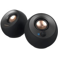 Black Creative Labs Pebble V2 speakers with copper accents and volume knob on spherical design.