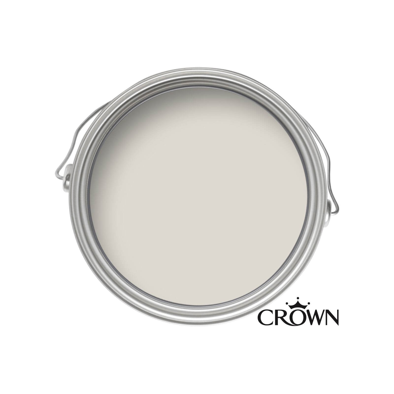 Crown Silk Paint Emulsion in "Snowfall" color, 2.5L metal tin with a smooth, creamy beige surface and the Crown logo prominently displayed.