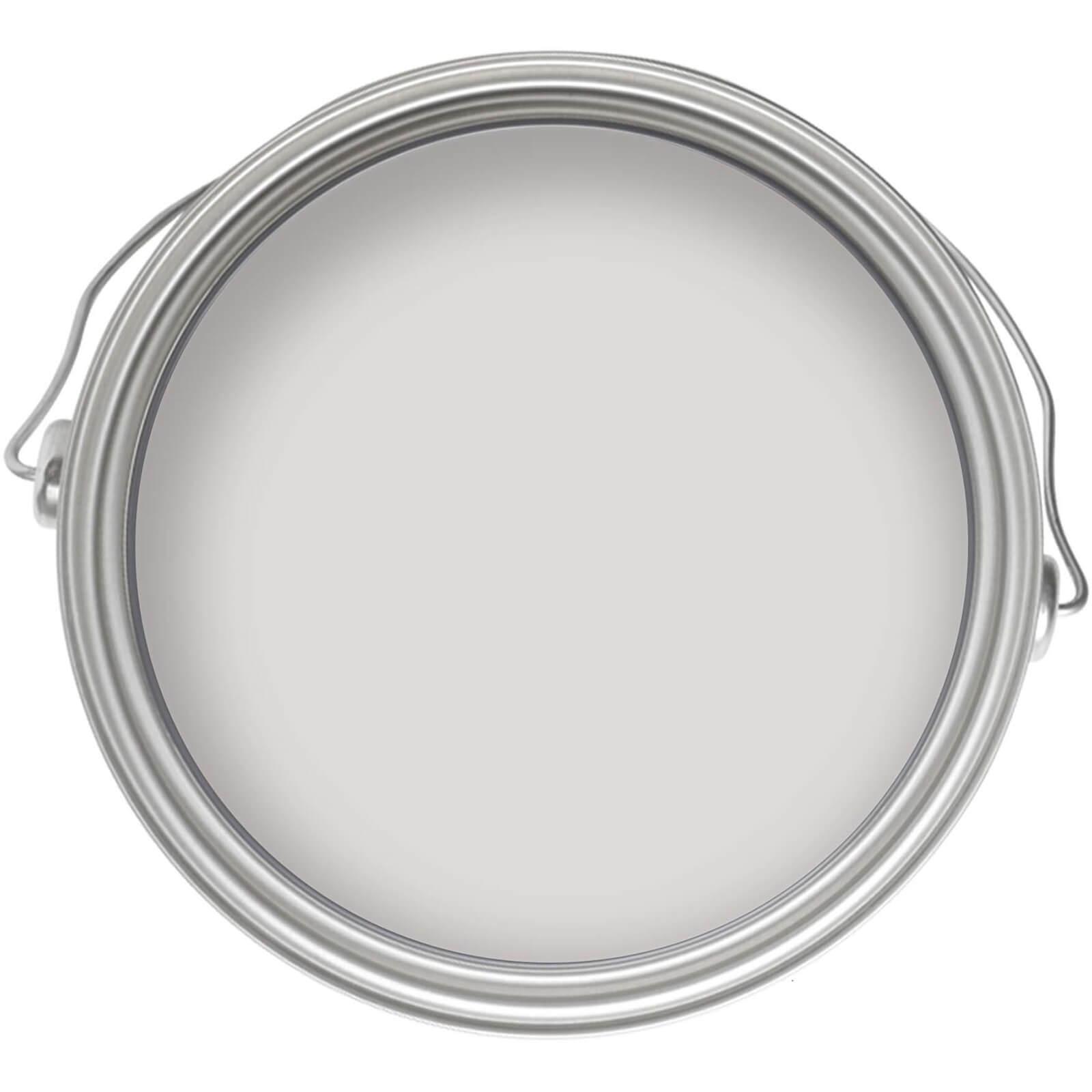 Round metal paint can with a silver lid, containing 2.5 liters of Crown Walls and Ceilings Silk Emulsion Paint in a light, soft white shade labeled "Spotlight."