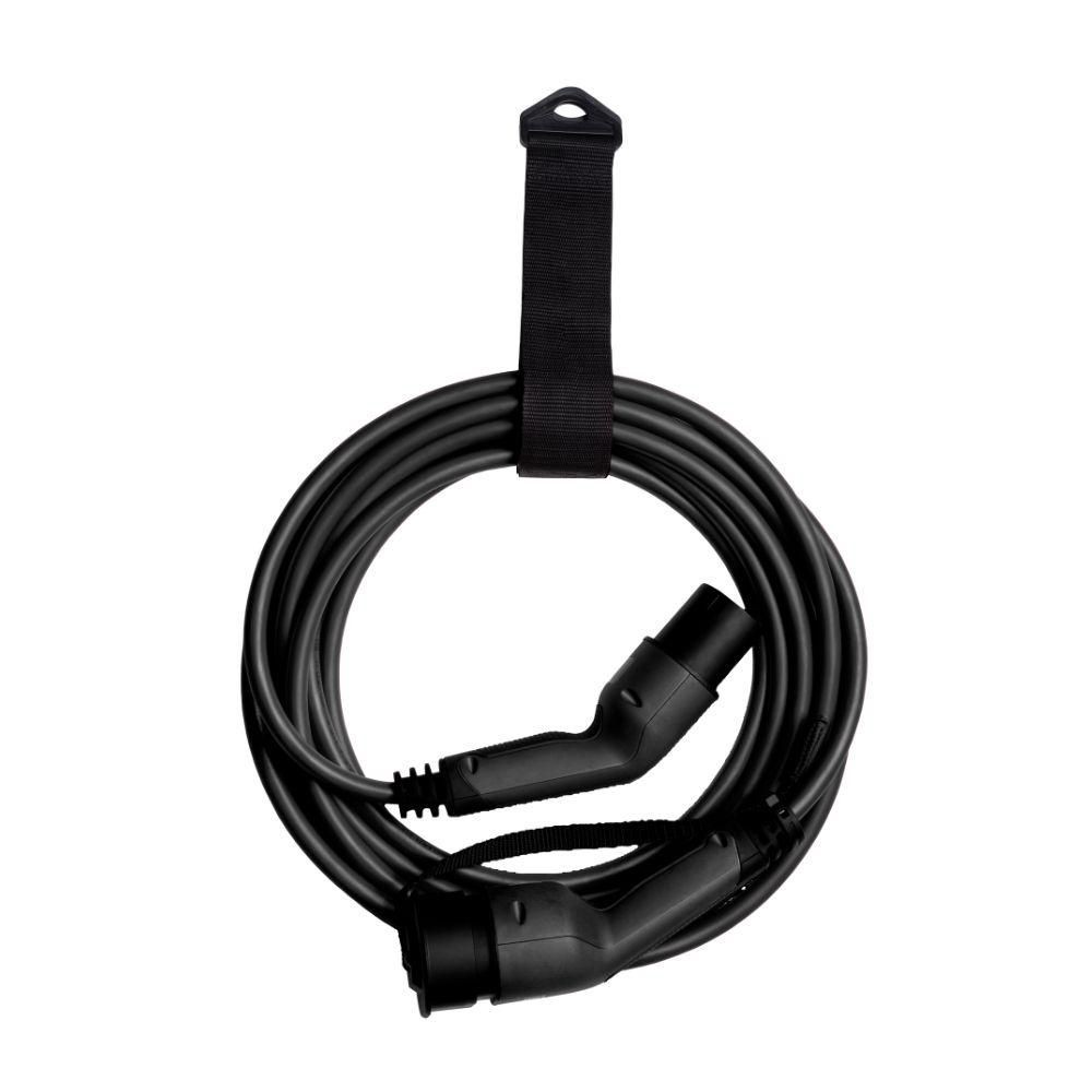 Black charging cable with a coiled design and two connectors, featuring a hanging strap for easy storage, designed for electric vehicle charging.