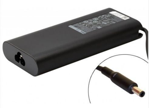Black rectangular power adapter with a 3-pin input, labeled "DELL C Dper 130W," outputting 19.5V, featuring a round connector tip and a textured surface.