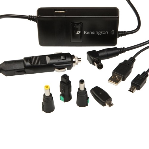 Black DELL Notebook Auto/Air Adapter with a rectangular power supply, multiple interchangeable tips, USB port, and a car charger plug, designed for charging laptops on the go.