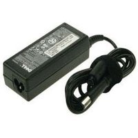 Black Dell NX061 power adapter with rectangular shape, attached cable, and label with specifications.
