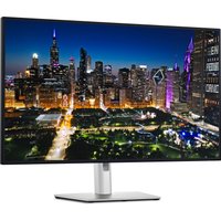 Black and silver Dell UltraSharp 31.5" monitor with slim bezels and 4K Ultra HD display showing a cityscape.