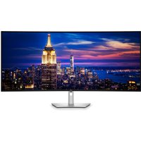 Dell UltraSharp U5226KW 52" monitor, ultra-wide screen, thin bezels, silver stand, displaying cityscape at dusk.