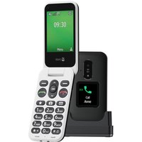 Black and white Doro Leva E30 feature phone with large buttons, green screen, and charging dock.