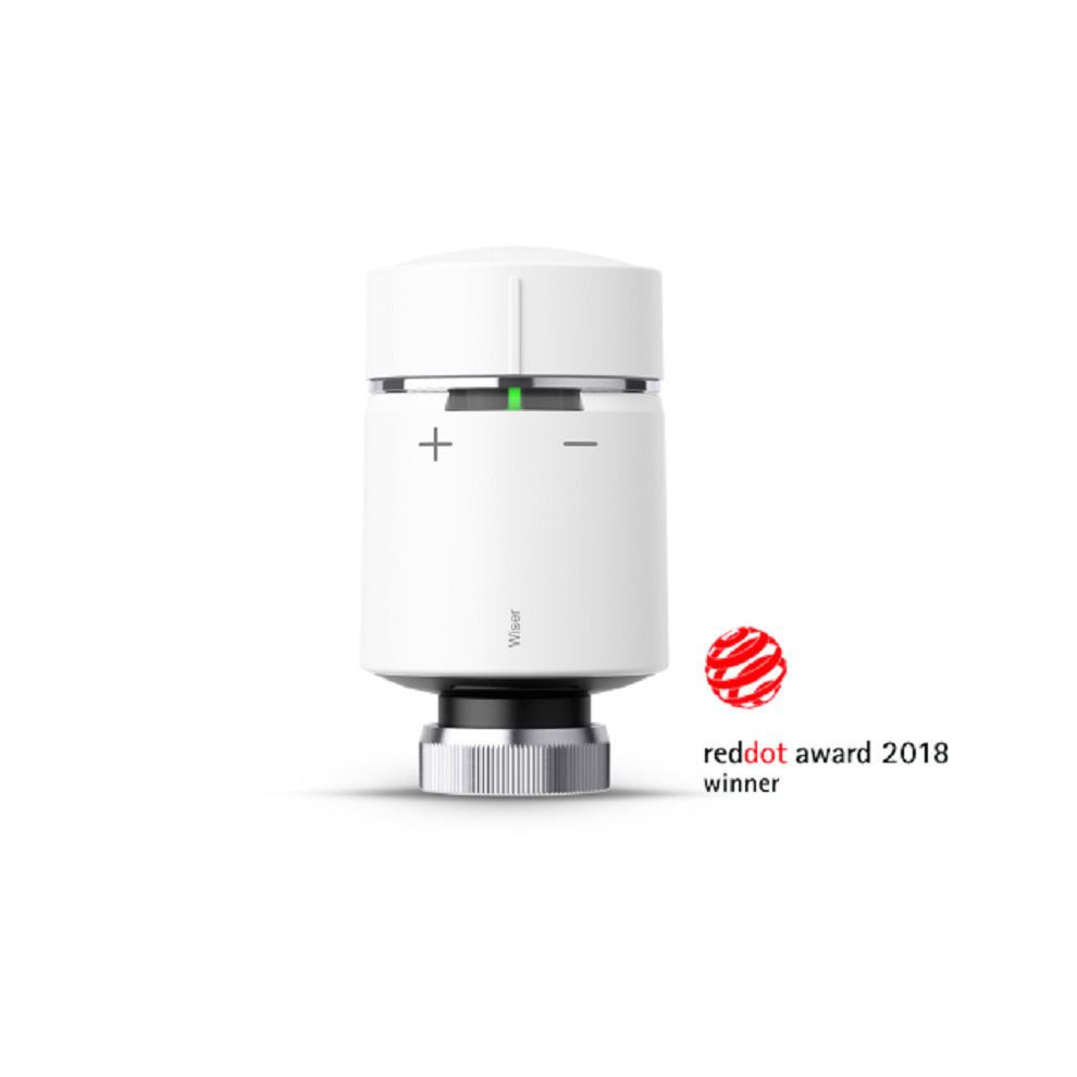White thermostatic radiator valve with a sleek design, featuring a silver base, plus and minus temperature controls, and a green indicator light, awarded Red Dot 2018.