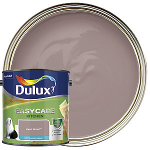 Dulux Easycare Kitchen Matt paint in Heart Wood shade, featuring a round tin with a blue label and a matching circular paint swatch in a soft, muted mauve color.