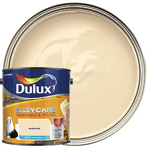 Dulux Easycare Washable and Tough Matt paint in Buttermilk, 2.5L, featuring a creamy yellow color with a glossy finish, displayed in a round tin beside a paint swatch.