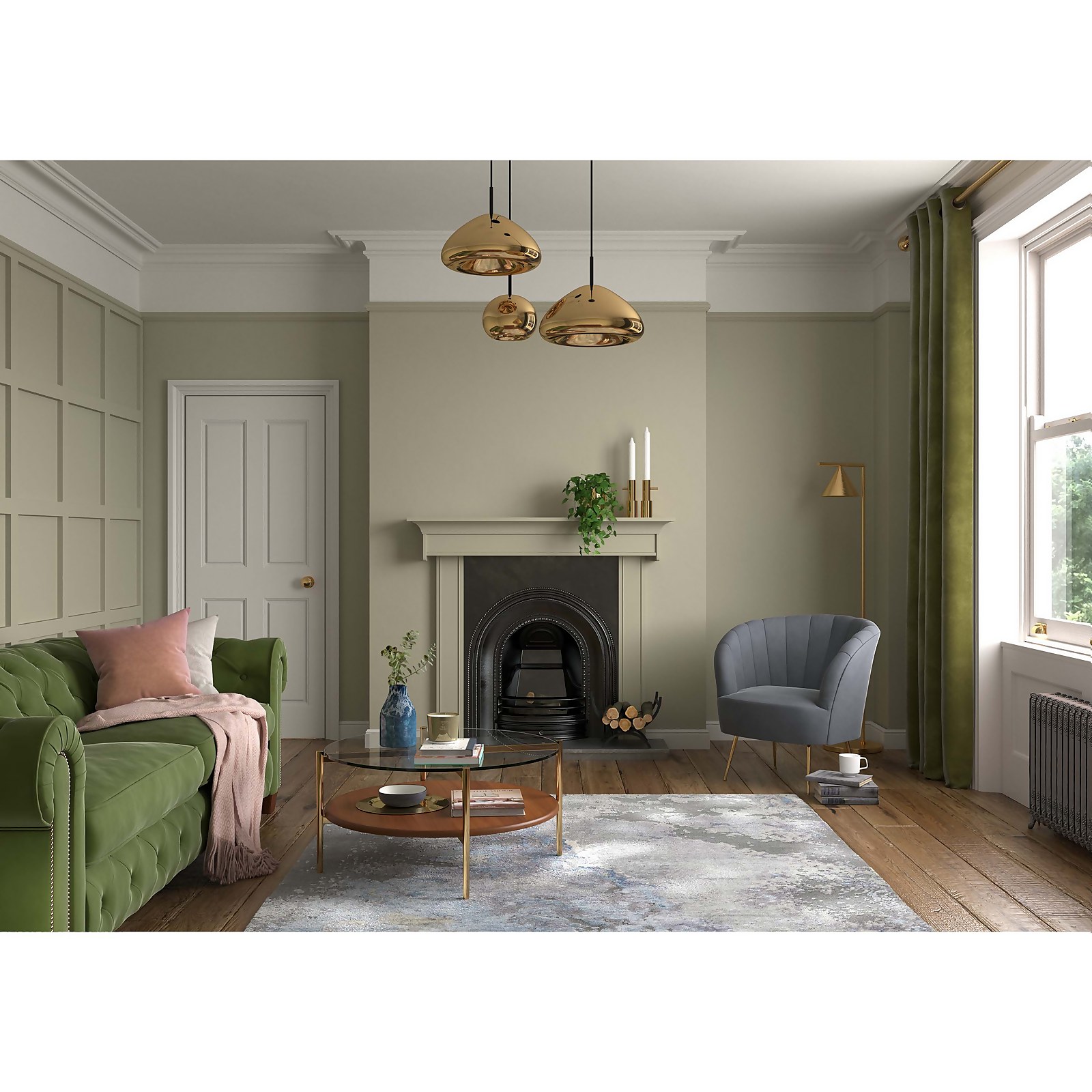 Dulux Heritage Matt Emulsion Paint in Olive Tree, a soft olive green, showcased in a stylish living room with a green sofa, modern armchair, and elegant decor.