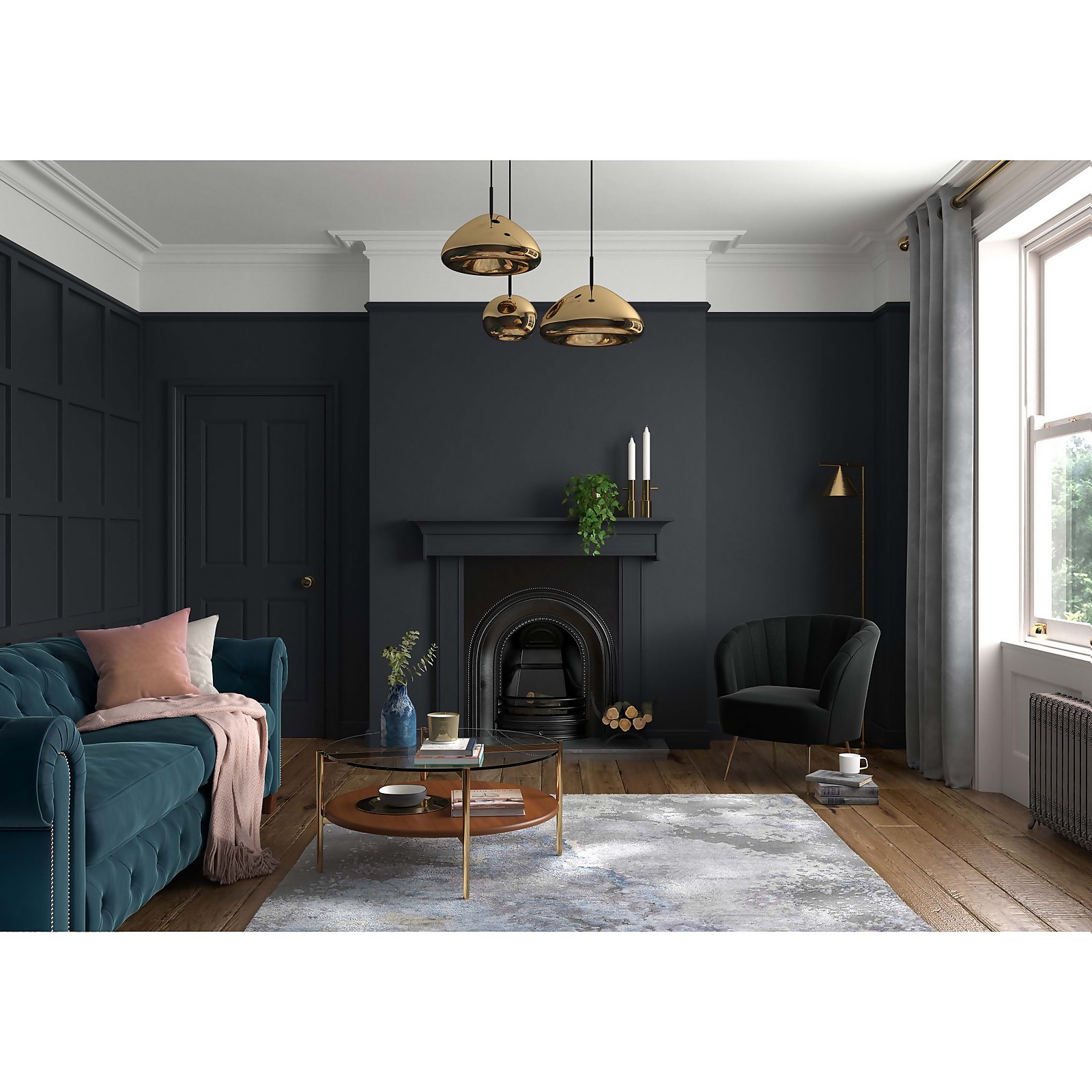 Dulux Heritage Ravens Flight Matt Emulsion Paint in a dark, rich hue, showcased in a stylish interior with a blue sofa, wooden flooring, and modern lighting fixtures.