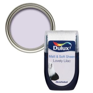Dulux Lovely Lilac Vinyl Matt Emulsion Paint in a 30ml tester pot, featuring a soft lilac color with a glossy lid and a round metal paint can showing the same shade.