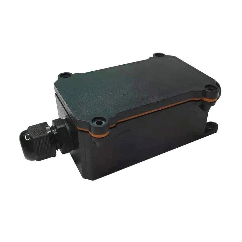 White ENER-J Smart Wi-Fi outdoor relay switch with a compact rectangular design, featuring a black connector and orange sealing ring for weather resistance.