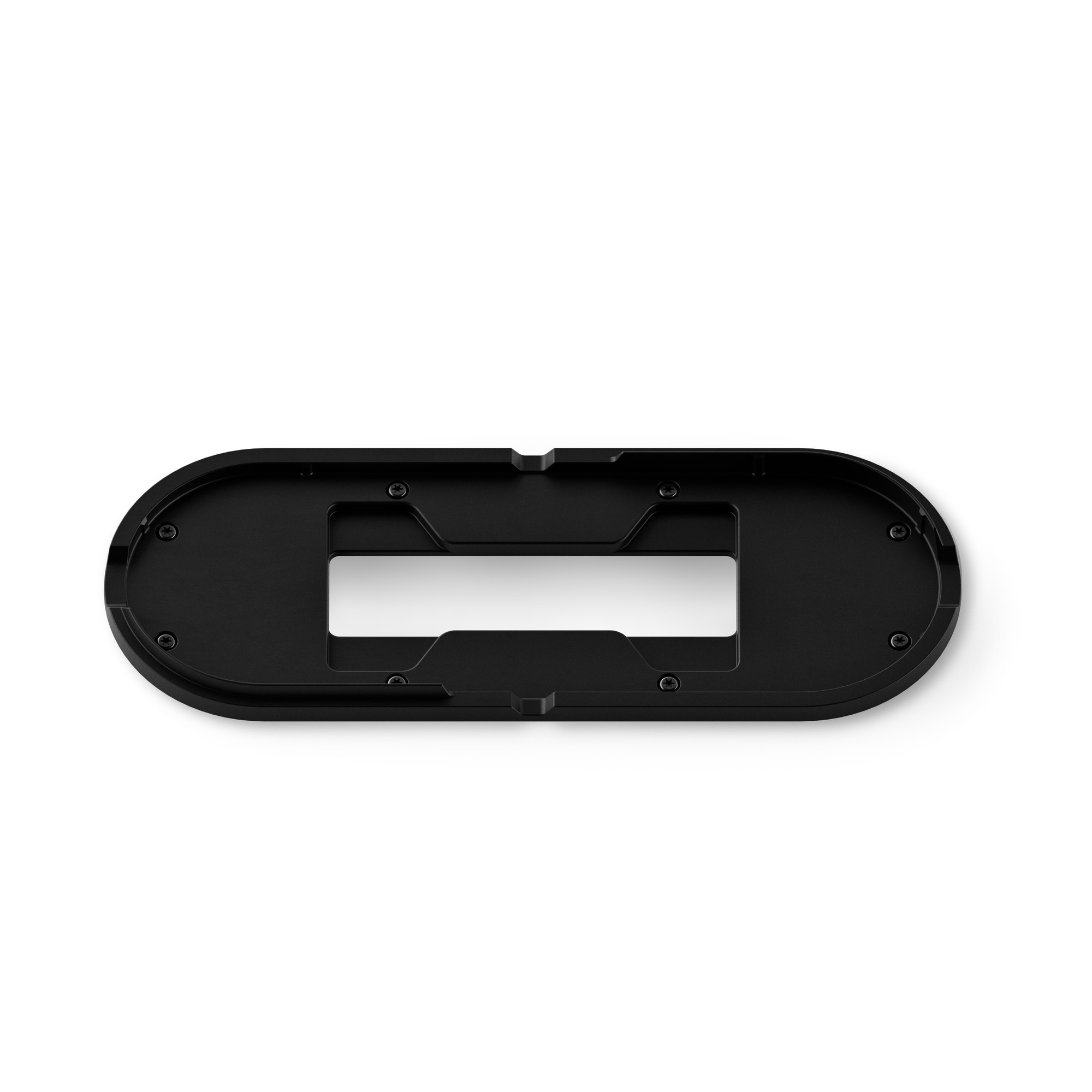 Black, oval table fixture made of durable plastic, featuring a central cutout for device placement and a sleek, minimalist design suitable for modern workspaces.