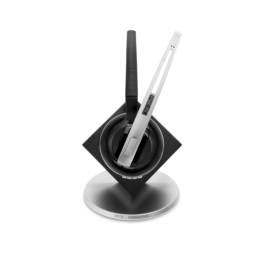 Wireless headset with a sleek black and silver design, featuring a comfortable earcup and a flexible microphone, resting on a stylish charging stand.